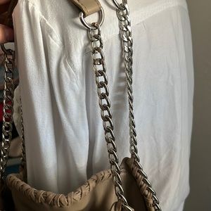 Beige leather purse with silver
